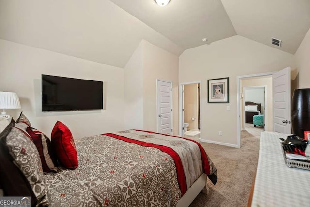 bedroom with baseboards, visible vents, connected bathroom, light colored carpet, and lofted ceiling