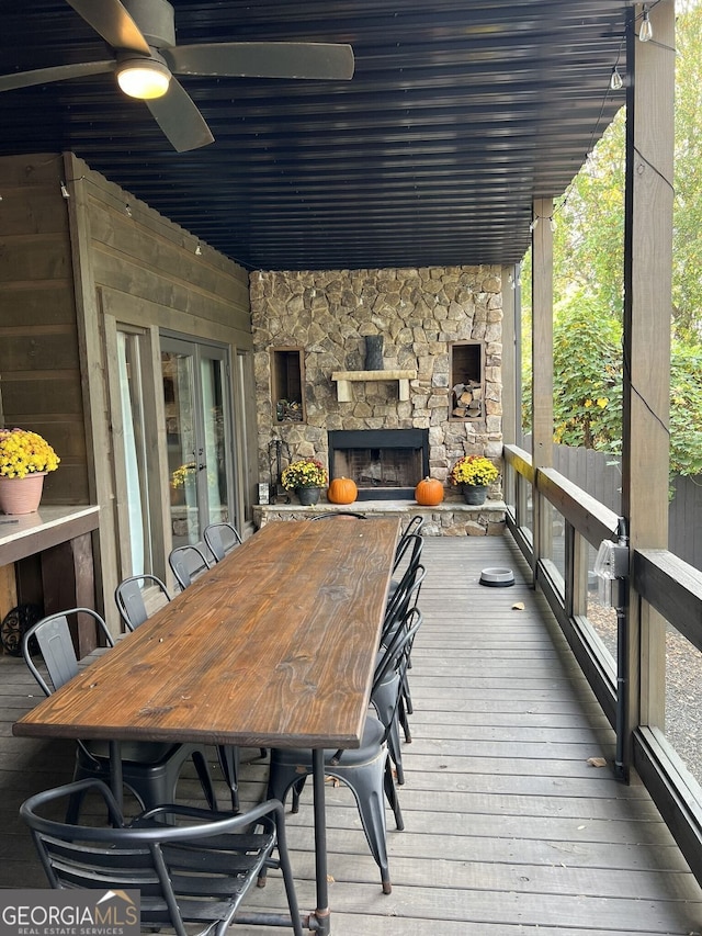 330 E Second St, Blue Ridge, GA 30513 - wooden terrace with an outdoor stone fireplace, a ceiling fan, and french doors