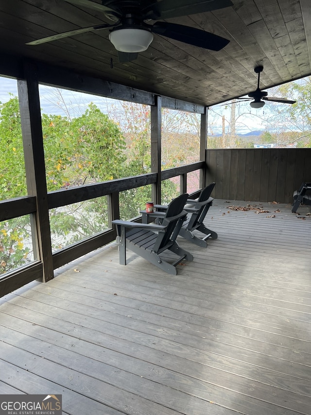 wooden terrace with ceiling fan