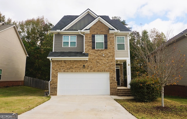 craftsman house with a garage and a front yard