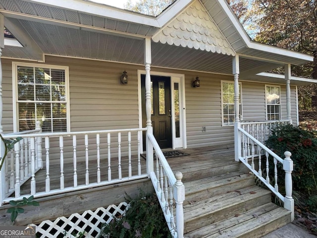 entrance to property with a porch