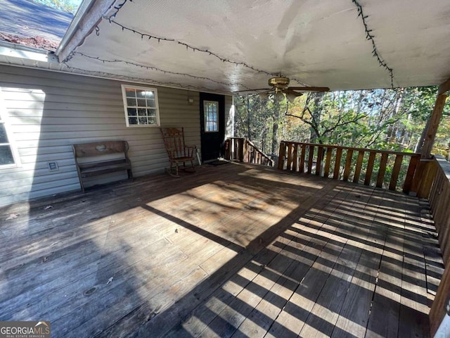 wooden terrace with ceiling fan