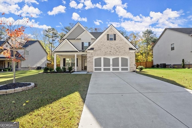 craftsman-style home with cooling unit, covered porch, and a front lawn