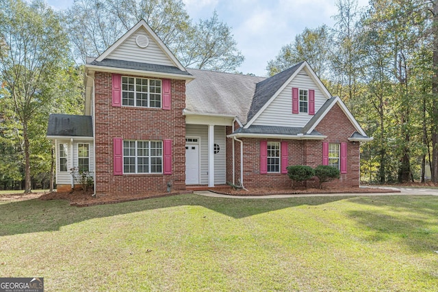 view of front property with a front lawn