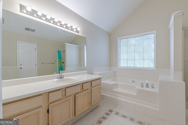 bathroom with separate shower and tub, lofted ceiling, tile patterned floors, and vanity