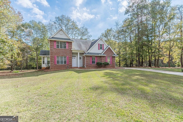 view of front of home with a front lawn