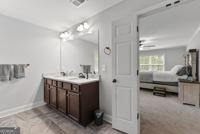 bathroom featuring vanity and ceiling fan