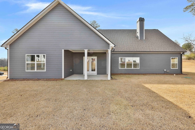 back of property featuring a patio