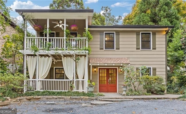 view of front of property with covered porch, french doors, and ceiling fan