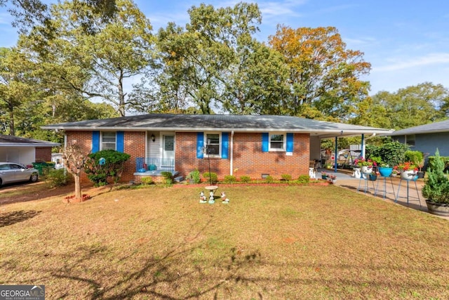 single story home with a front lawn and a carport