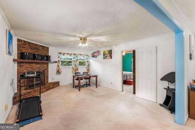 interior space with ceiling fan and ornamental molding