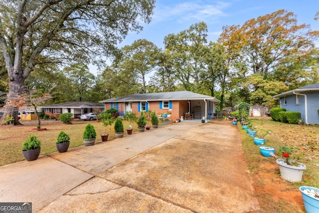 ranch-style house with a carport