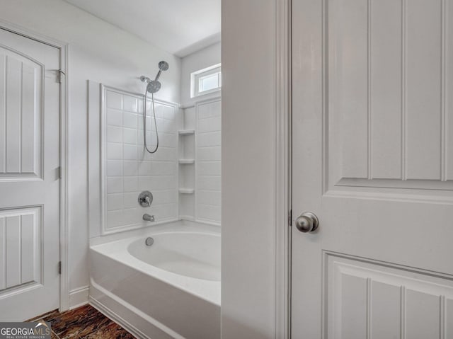 bathroom with shower / washtub combination