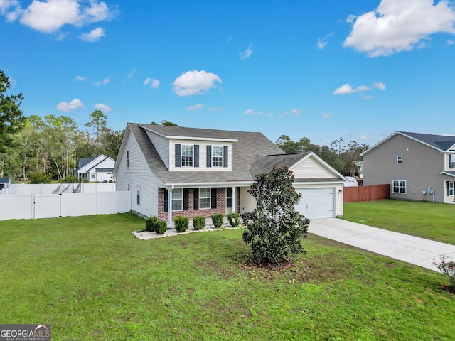 view of front facade with a garage and a front yard