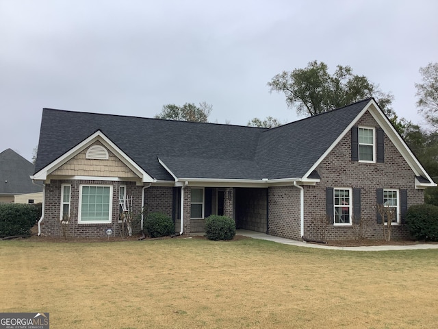 view of front of home with a front lawn