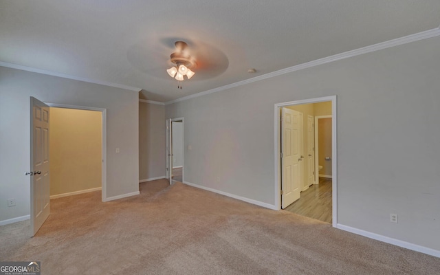 unfurnished bedroom with ceiling fan, light carpet, and ornamental molding