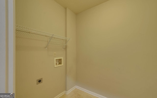 clothes washing area featuring washer hookup and hookup for an electric dryer