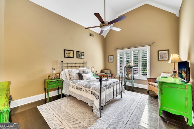 bedroom featuring crown molding, high vaulted ceiling, dark hardwood / wood-style floors, and ceiling fan