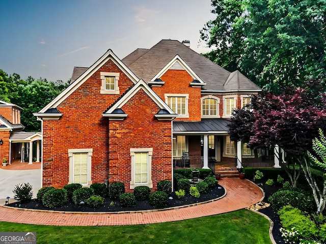 craftsman inspired home featuring covered porch