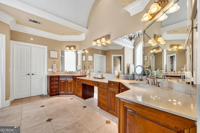 bathroom with vanity, tile patterned flooring, and ornamental molding