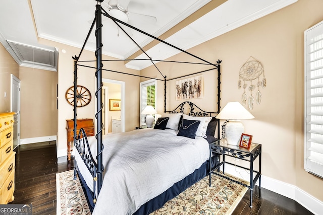 bedroom with ceiling fan, dark hardwood / wood-style floors, ensuite bath, and ornamental molding