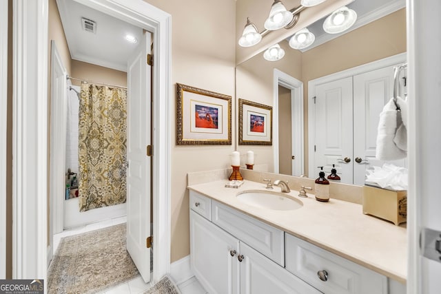 bathroom featuring shower / bath combo, vanity, and tile patterned floors