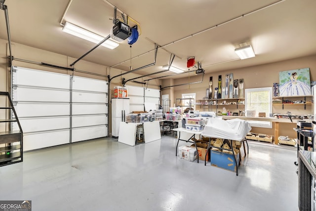 garage featuring a garage door opener