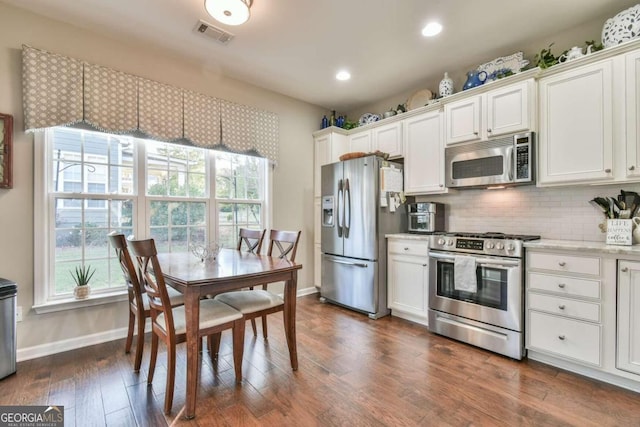 kitchen featuring white cabinets and stainless steel appliances