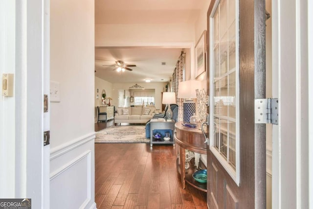 hallway featuring dark hardwood / wood-style flooring