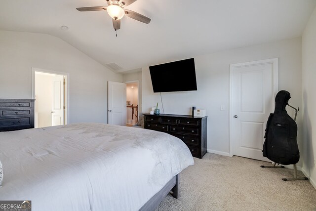 carpeted bedroom featuring ceiling fan and lofted ceiling