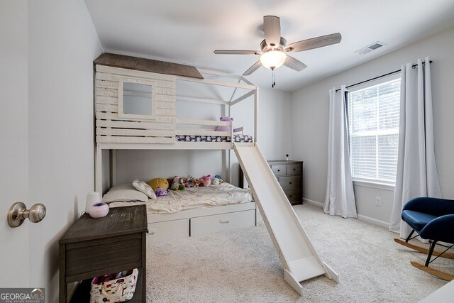 carpeted bedroom featuring ceiling fan