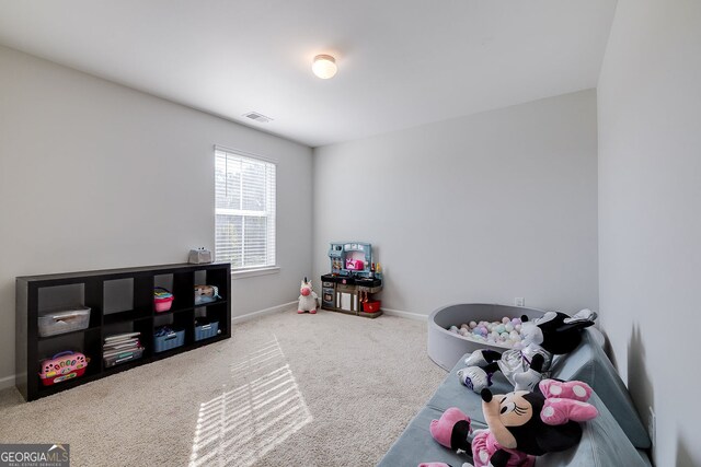 playroom featuring carpet flooring