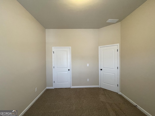 spare room featuring carpet