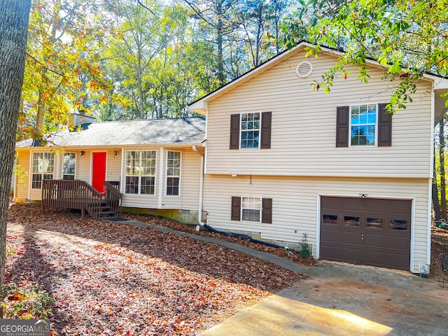 split level home featuring a garage