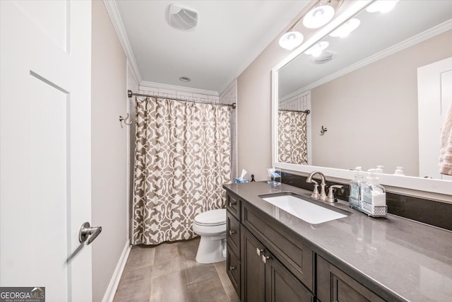 bathroom featuring toilet, vanity, and crown molding