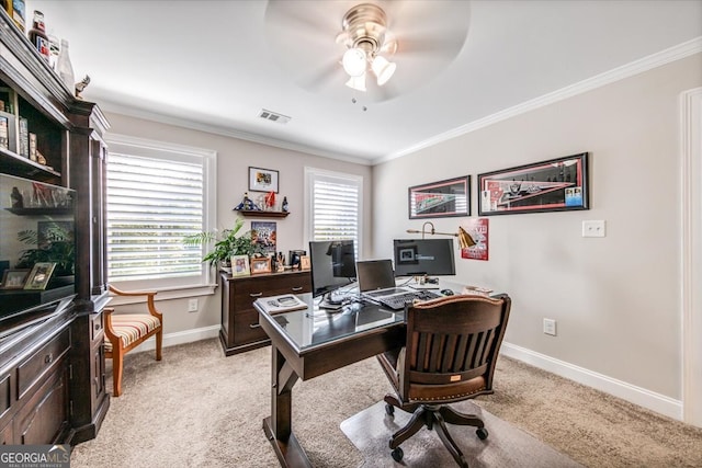 office area featuring ceiling fan, light colored carpet, and ornamental molding