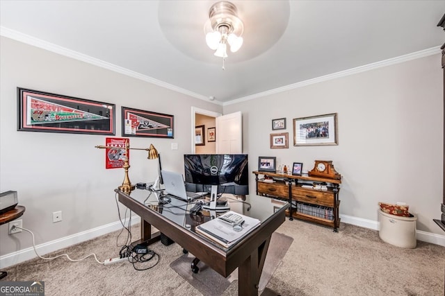 carpeted office space with ornamental molding and ceiling fan