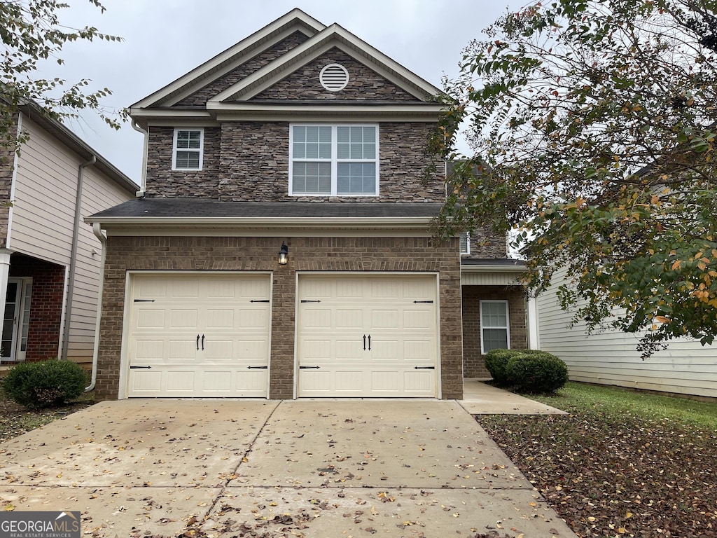 view of property featuring a garage