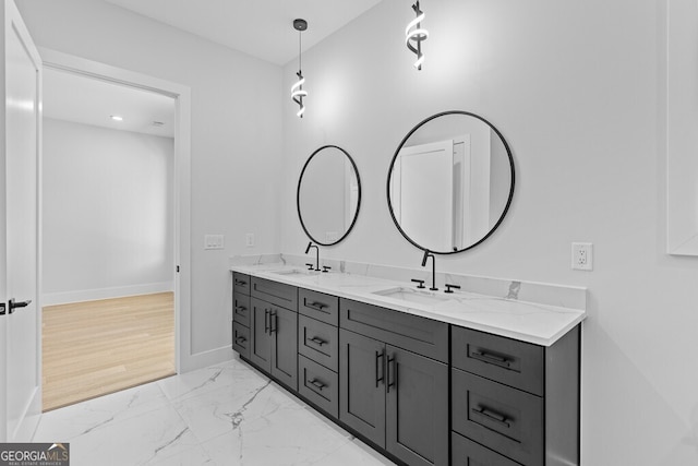 bathroom featuring wood-type flooring and vanity