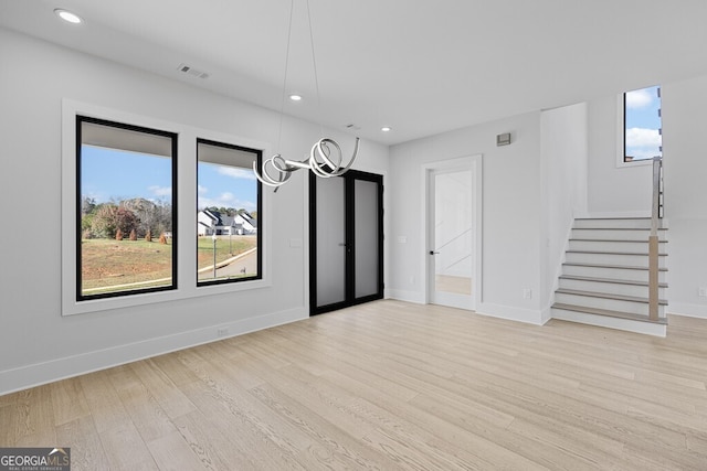 interior space with a healthy amount of sunlight and light hardwood / wood-style floors