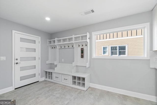 mudroom with visible vents and baseboards