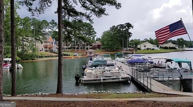 view of dock with a water view