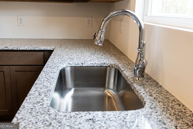 89 Hampton Ridge Way, Jefferson, GA 30549 - kitchen view of a sink and dark brown cabinetry