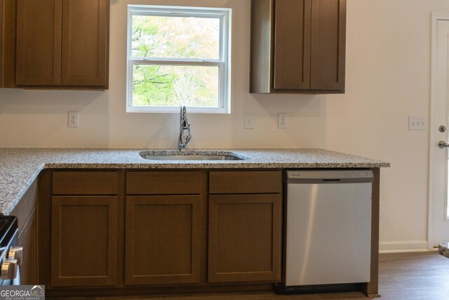 89 Hampton Ridge Way, Jefferson, GA 30549 - kitchen featuring dishwasher, a sink, light countertops, wood finished floors, and range