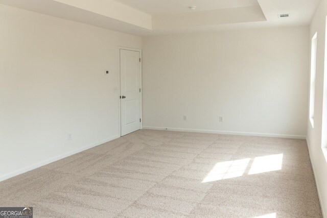 89 Hampton Ridge Way, Jefferson, GA 30549 - empty room with carpet flooring, a raised ceiling, and baseboards