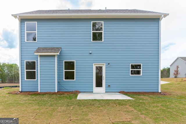 89 Hampton Ridge Way, Jefferson, GA 30549 - back of property with a patio and a lawn