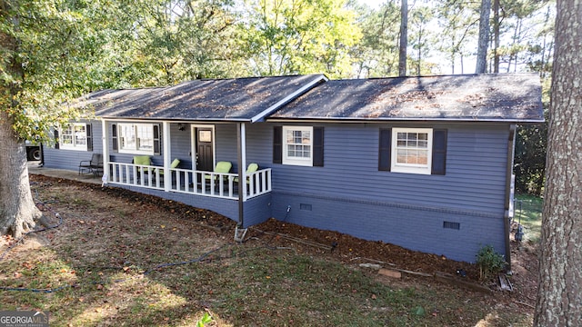 single story home featuring covered porch