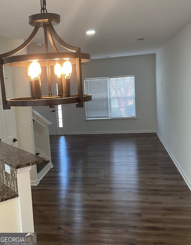 interior space with dark hardwood / wood-style flooring