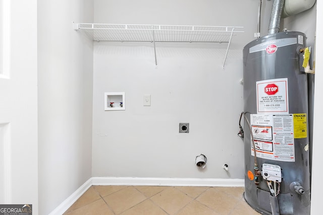 laundry area with electric dryer hookup, tile patterned floors, water heater, hookup for a washing machine, and hookup for a gas dryer