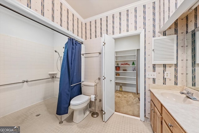 bathroom with a shower with curtain, vanity, crown molding, tile patterned floors, and toilet